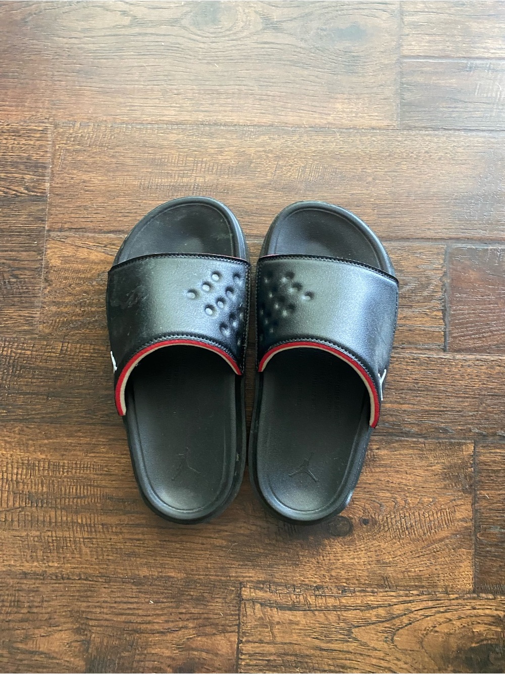 Nike Jordan Kids Black Slide Sandals with Red Accent